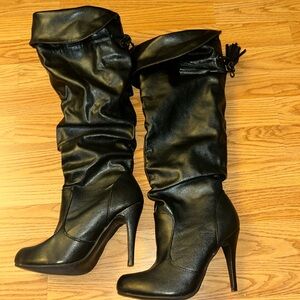 SceneBlack over the knee stiletto heeled boot“Yudelka” size 9. New without box.